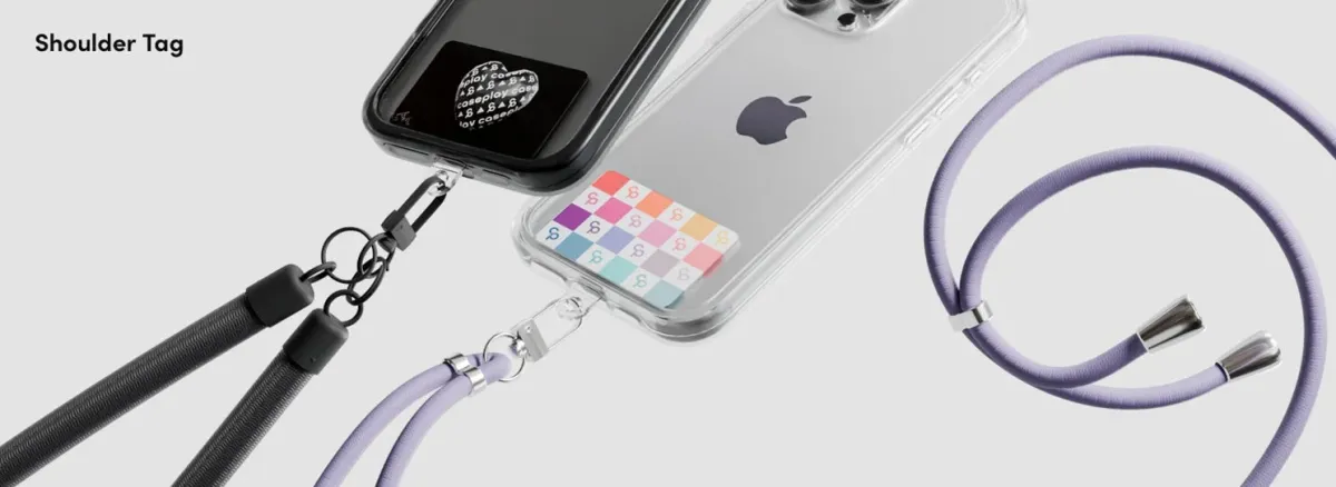 スマートフォンにショルダーストラップを取り付けるためのアクセサリーが写っています。