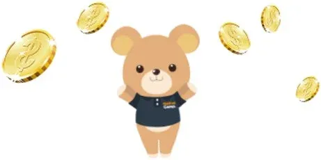 かわいいクマのキャラクターが金貨に囲まれているイラスト