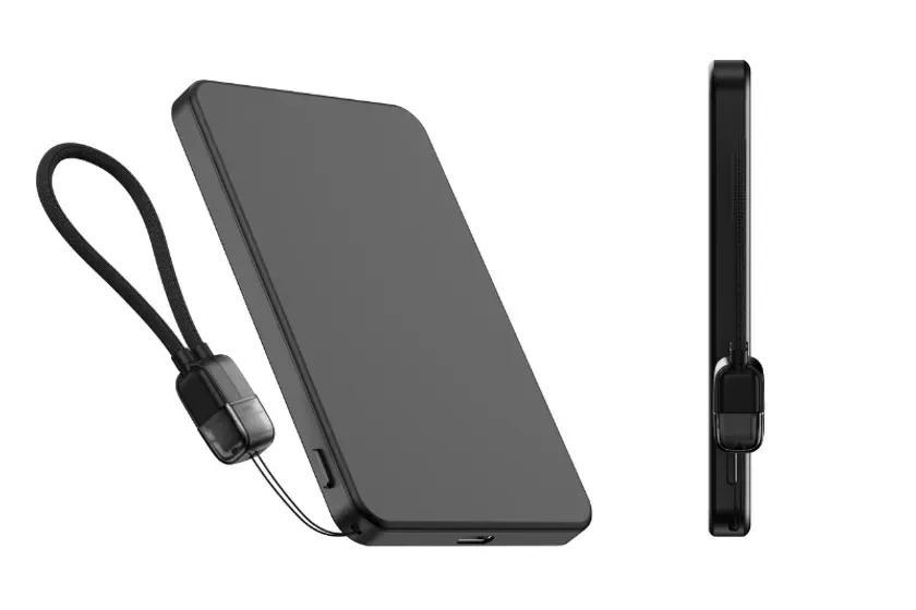 黒くて薄型の電子機器で、手首にかけられるストラップが付いている