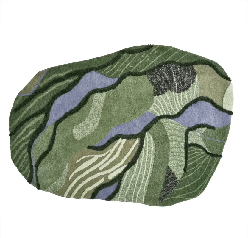 緑と青の抽象的な風景画のようなラグ