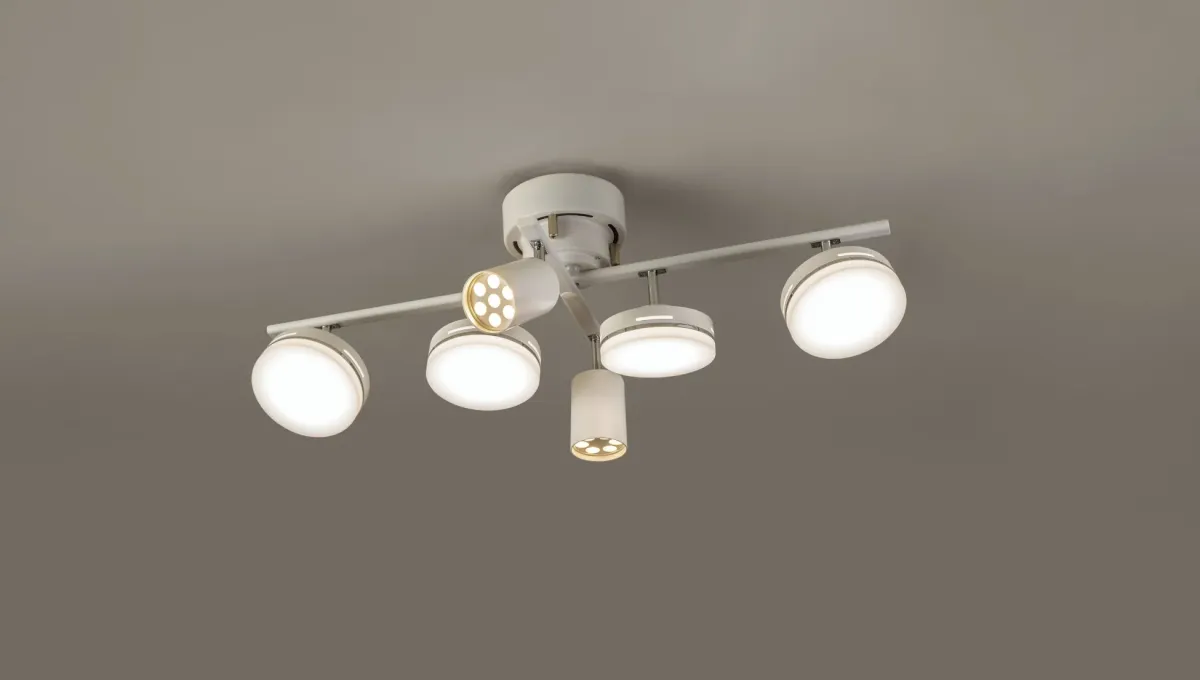 白い天井に取り付けられたモダンなシーリングライト。複数のLEDスポットライトが様々な方向を照らすように配置されており、部屋全体を明るくするデザインです。