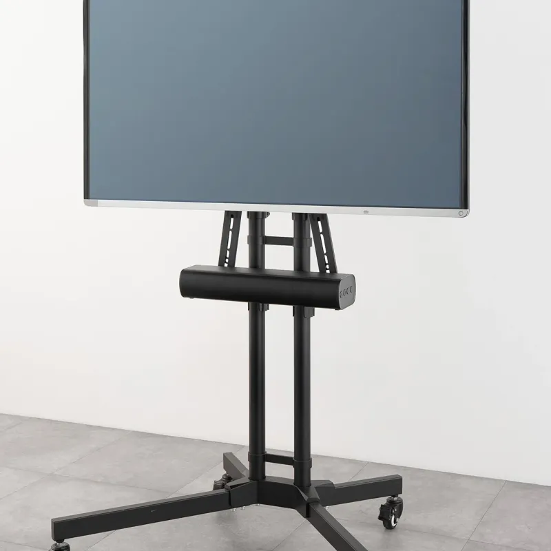 テレビスタンドに設置されたディスプレイとサウンドバー