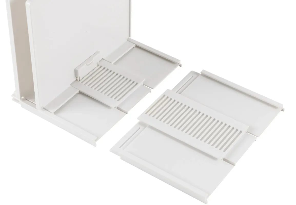 白いプラスチック製の収納部品